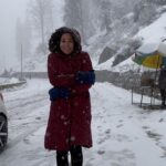 Kanchi Kaul Instagram - This was , by far , the most adventurous day of the trip ! We started out by going out to a snow slope for some mad fun tubing . The weather started changing at midday. We drove through the longest (9km) and highest (above 10000 feet ) single tube tunnel in the world, in the Pari Panjal range of the mighty Himalayas. It was Empty (its always full ) , which means in a matter of minutes , the border roads organisation had shut it down and we had a feeling something had happened!!! As soon as we got out of the tunnel , we were stuck in a full fledged #snowstorm!!! Forget the littles , even I hadn’t experienced something like this ever before in my life . And we were stuck with many other cars on a downward slope up on a mountain …. 🥶 It was - 5 degrees Celsius at 2 pm.brrrrrrrr Thankfully we were always prepped for all sorts of mountain behaviours ( and yes, they are highly unpredictable ) and were in no danger in any way . Again , so much to be grateful for !!! In between So many crucial decisions and so much patience , the littles and me sat there staring at all what the mountains had to offer!!! The snowflakes fell one by one at first, but then their numbers increased, two by two, 10 by 10, then more than we could possibly count. If we would let go of the focus in our eyes , the falling show would look like a driving torrent of snowflakes,and they were . ❄️🌨️ We finally got home with all the lovely help from the mountain people there and some snow cutters too 😜 The immaculate but tough and a very slow drive through the icy slopes , trying so hard not to apply the break , not to skid , the littles on their full guard , ready for anything…. Waiting to tell their adventures to all back home while we cuddled up in each other’s warmth and thanked the almighty for yet another beautiful day!!! We made it and added some vital life skills while we were at it !!! Yippie!!!! #mountains #himalayas #incredibleindia #theadventuresofAI #neveradullmoment #wanderlust #incredibleindia #mothernature #wildandfree #snow #blizzard #reels #reelsinstagram #dhundi