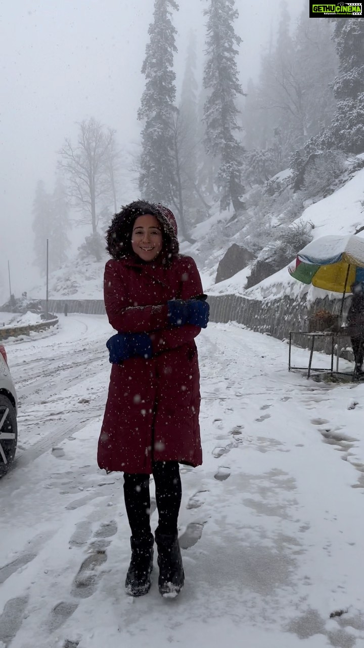 Kanchi Kaul Instagram - This was , by far , the most adventurous day of the trip ! We started out by going out to a snow slope for some mad fun tubing . The weather started changing at midday. We drove through the longest (9km) and highest (above 10000 feet ) single tube tunnel in the world, in the Pari Panjal range of the mighty Himalayas. It was Empty (its always full ) , which means in a matter of minutes , the border roads organisation had shut it down and we had a feeling something had happened!!! As soon as we got out of the tunnel , we were stuck in a full fledged #snowstorm!!! Forget the littles , even I hadn’t experienced something like this ever before in my life . And we were stuck with many other cars on a downward slope up on a mountain …. 🥶 It was - 5 degrees Celsius at 2 pm.brrrrrrrr Thankfully we were always prepped for all sorts of mountain behaviours ( and yes, they are highly unpredictable ) and were in no danger in any way . Again , so much to be grateful for !!! In between So many crucial decisions and so much patience , the littles and me sat there staring at all what the mountains had to offer!!! The snowflakes fell one by one at first, but then their numbers increased, two by two, 10 by 10, then more than we could possibly count. If we would let go of the focus in our eyes , the falling show would look like a driving torrent of snowflakes,and they were . ❄️🌨️ We finally got home with all the lovely help from the mountain people there and some snow cutters too 😜 The immaculate but tough and a very slow drive through the icy slopes , trying so hard not to apply the break , not to skid , the littles on their full guard , ready for anything…. Waiting to tell their adventures to all back home while we cuddled up in each other’s warmth and thanked the almighty for yet another beautiful day!!! We made it and added some vital life skills while we were at it !!! Yippie!!!! #mountains #himalayas #incredibleindia #theadventuresofAI #neveradullmoment #wanderlust #incredibleindia #mothernature #wildandfree #snow #blizzard #reels #reelsinstagram #dhundi