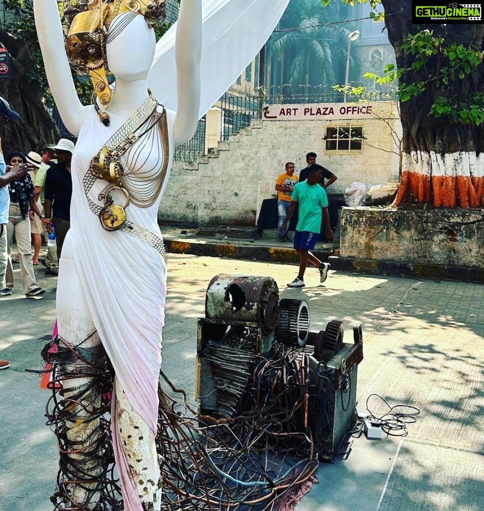 Kanchi Kaul Instagram - This February Sunday is a permanent mark on our calendars, every year!!! The atmosphere of seeing so many artists come together to present some really cool , beautiful , out of the box art installations in the most historic part of the city on the roads, out in the open , is always a pleasure and this year was no different. Pepsi cola for 50 paise outside school was my version of junk joy in my childhood. Never would it have crossed my mind that I would repeat that with my boys decades later and enjoy it even better 😀 This years theme was “ past forward” and of course had a lot to do with sustainability . To get into somebody else’s mindset into creating an art piece is an amazing journey and learning in itself. Something every child, every human should be exposed to. The childrens museum had some wonderful art exhibits put up by various schools around the city , all put in their collective , artistic and sustainable efforts for everyone to experience . Sitting in the open , listening to stories, surrounded by other kids, grasping it all in ❤️‍🔥 Walking through a museum with stuffed animals , used for research and study, we learnt so many new things including that this art is called #taxidermy . The day ended with a carnival at the derby. The beautiful sport of horse racing, (thank you dad 💖) learning about horses , their behaviours, their track records,how they train, and show off that insane horse power, so majestically. Just marvellous!!!! Although all exhibits were outstanding , Slide 7 really resonated with us …. Footwear is something constant throughout our life journey just like lifes highs and lows . coming down the slide is always a joyous moment, so in life’s journey, even when we go through the low phases , let us feel like we’re going down the slide and enjoy even that so that we learn some thing out of the experience and come out better from it “सुख” so much to be thankful for, always! #onelife #happydays #makethemostofit #peace #explore #art #artfestival #kalaghoda #derby #horseracing #carnival #theadventuresofAI #neveradullmoment #thebeautyofeverything #gadgetfreechildhood #grateful