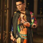 Karan Johar Instagram - In the mood of the season…. Styled by @anaitashroffadajania in @sabyasachiofficial 📷 @sheldon.santos