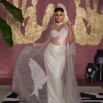 Kareena Kapoor Instagram - For the bride’s 80s flapper girl style after party for when she is ready to unwind…or perhaps a modern day princess at a wedding party in the Hamptons? Kareena is stunning in the white ‘Son Chidiya’ cape set embellished in pearls and sitaras. #TheMasabaBride #HouseofMasaba