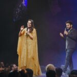 Keerthi shanthanu Instagram - On stage ✨🎤 #isaivellam2023 #canada Loved working & being there😇 Overwhelmed with all ur love 💛 After a long time with this fun loving guy @rjvijayofficial 💛 This golden outfit from @studio149 💛 Thanks to @latikaproductions @latikagoldhouse for havin us💛 Thanx for the pics ma @sobejan.photography ✨