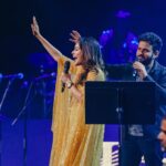 Keerthi shanthanu Instagram – On stage ✨🎤
#isaivellam2023 #canada Loved working & being there😇 Overwhelmed with all ur love 💛
After a long time with this fun loving guy @rjvijayofficial 💛
This golden outfit from @studio149 💛
Thanks to @latikaproductions @latikagoldhouse for havin us💛
Thanx for the pics ma @sobejan.photography ✨