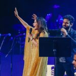 Keerthi shanthanu Instagram - On stage ✨🎤 #isaivellam2023 #canada Loved working & being there😇 Overwhelmed with all ur love 💛 After a long time with this fun loving guy @rjvijayofficial 💛 This golden outfit from @studio149 💛 Thanks to @latikaproductions @latikagoldhouse for havin us💛 Thanx for the pics ma @sobejan.photography ✨