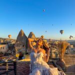 Kritika Sharma Instagram – The most favourite part of my turkey trip to do this 🤍 #gratitude 
Outfit @sainygargcouture 
Styled by @_vaishnavii.3011 
Location @sultan_cave_suites 

#travel #whitedress #cappadocia #hotairballoon #photoshoot #terrace Sultan Cave Suites