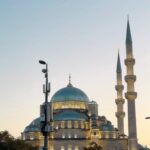 Kritika Sharma Instagram – Tourists Spots to visit in Istanbul Part – 2 
1.  Blue Mosque 
2.  Seven Hills restaurant – they let you feed the birds and you can see blue mosque and Hagia Sofia as well so do visit 
3.  Grand Bazaar – For shopping and bargaining is must ! 
4.  Topkapi Palace 
5.  Galata Tower 
6.  Suleymainiye Mosque
7.  Taksim Street 
8.  Baklava and Turkish Tea 
9.  Kumpir – potato filled with veggies and sauces a famous street food for vegetarians 
10. The famous St Sebastian cake at Galata Tower! 
 
Comment below if you have any questions ! 
Outfit Details
Blue dress @thesushclothing 
Orange dress @label.taikee 
Styled by @_vaishnavii.3011 

#turkey #istanbul #2023 
#touristsplacesinistanbul #travel #tourist Istanbul, Turkey