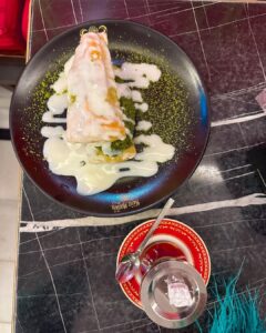 Kritika Sharma Instagram - Tourists Spots to visit in Istanbul Part - 2 
1.  Blue Mosque 
2.  Seven Hills restaurant - they let you feed the birds and you can see blue mosque and Hagia Sofia as well so do visit 
3.  Grand Bazaar - For shopping and bargaining is must ! 
4.  Topkapi Palace 
5.  Galata Tower 
6.  Suleymainiye Mosque
7.  Taksim Street 
8.  Baklava and Turkish Tea 
9.  Kumpir - potato filled with veggies and sauces a famous street food for vegetarians 
10. The famous St Sebastian cake at Galata Tower! 
 
Comment below if you have any questions ! 
Outfit Details
Blue dress @thesushclothing 
Orange dress @label.taikee 
Styled by @_vaishnavii.3011 

#turkey #istanbul #2023 
#touristsplacesinistanbul #travel #tourist