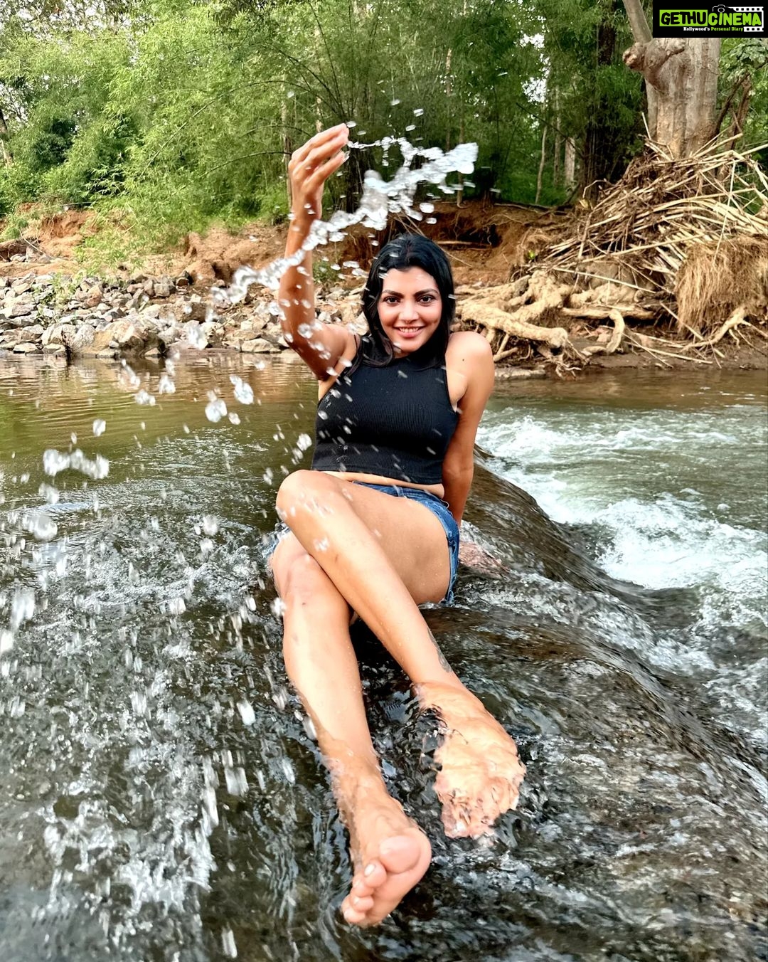 Lahari Shari Instagram - Just me, a rock, and the river. Finding joy in the simple pleasures of life.π Photographer : @troyphotographyofficial #WaterPlay #RiverVibes #NatureLover #HappinessIsHere #SmilingFromEarToEar #LivingInTheMoment #BlissfulDays #RockingWithNature #SereneSerenade Hyderabad
