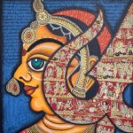 Lisa Ray Instagram - Subho Ashtami! This is Durga, the Divine Mother who epitomises Shakti or energy and wards off all evil. She is painted in a very traditional phad style in profile, and the Trishul or Trident that is in the foreground for protection is typical phad art with narrative style art telling the story of he deities. The colors in the work are what any Phad would have, all natural pigments. For 700 years, this one family from Bhilwara in Rajasthan, were the makers of “Phad” art. A Phad (literally, fold) was a mobile temple, between 15 and 30 ft long, a hand woven coarse cotton cloth that was starched and shone with moonstone, commissioned by a Bhopa, or priest. The story was always of Devnarayan or Pabuji, both folk deities. As the Bhopa narrated the story, singing it to a rapt audience who watched the cloth unfold, his wife the Bhopi, danced the tale. Master Artist Kalyan took over the mantle of his father who started a school to expose their art to a wider world. He uses his art as a tool to narrate anything of social significance and to adapt it to other iconic Indian styles, creating his own interpretation. From #InSearchoftheDevi curated by @sripeepul available on @theupsidespace @joshi.kalyan