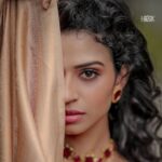 Meenakshi Raveendran Instagram - Let your wardrobe have a tiny time machine to your ethnicity Costumes&styling :@sans_kritidesigns & @ardraswathii Behind the lens- @hkcreationsdxb Recorded - @dop_by_tony Magic hands - @shibin4865 Jewellery:@dcjewellersgoldanddiamonds Saree draping: @rincyz_bridal_hub
