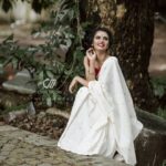 Meenakshi Raveendran Instagram - Kick the pleats of sheer elegance Mua @makeover_by_mufeee Concept and styling @amruthaappu @amal_gop Costume @vogue_designer_studio @zelah.and.i Costume assist @apolloblithe Photo @maplestories__ @cathmediastories @nithinsundher_photography Cinematography @the_oceaneyes_studio @_dytr_