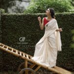 Meenakshi Raveendran Instagram - Kick the pleats of sheer elegance Mua @makeover_by_mufeee Concept and styling @amruthaappu @amal_gop Costume @vogue_designer_studio @zelah.and.i Costume assist @apolloblithe Photo @maplestories__ @cathmediastories @nithinsundher_photography Cinematography @the_oceaneyes_studio @_dytr_