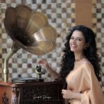 Meenakshi Raveendran Instagram - Let your wardrobe have a tiny time machine to your ethnicity Costumes&styling :@sans_kritidesigns & @ardraswathii Behind the lens- @hkcreationsdxb Recorded - @dop_by_tony Magic hands - @shibin4865 Jewellery:@dcjewellersgoldanddiamonds Saree draping: @rincyz_bridal_hub