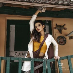 Meenakshi Raveendran Instagram - Kick the pleats of sheer elegance 

Mua @makeover_by_mufeee 

Concept and styling @amruthaappu @amal_gop 

Costume @vogue_designer_studio
@zelah.and.i 

Costume assist @apolloblithe

Photo @maplestories__ 
@cathmediastories 
@nithinsundher_photography

Cinematography @the_oceaneyes_studio
@_dytr_
