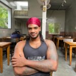 Michael Ajay Instagram - First Nomination week at Big Boss Kannada and Mike worked it with style in a Durag! (Swipe) The Durag is a grooming practice in Black American culture to avoid frizzy dreads and also as a style accessory. What do you think about this look?! 💪🏾😎 #michaelajay #fitnessmodel #durag #bigbosskannadaseason10 #bigbosskannada #teammike