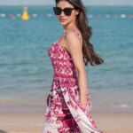 Mouni Roy Instagram - Thank you @QatarAirways @HIA @BagatelleBeachClubDoha @Formula1 for a lovely day Outfit @dolcegabbana 📸 @iamvish_photographer