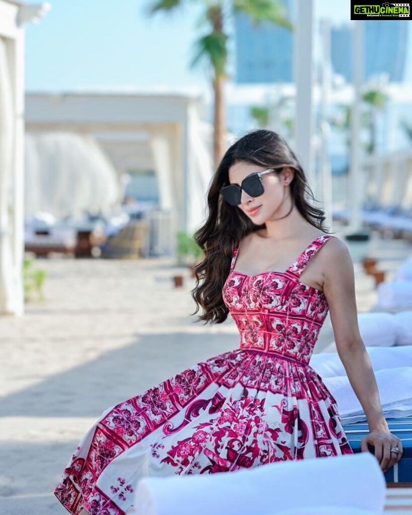 Mouni Roy Instagram - Thank you @QatarAirways @HIA @BagatelleBeachClubDoha @Formula1 for a lovely day Outfit @dolcegabbana 📸 @iamvish_photographer