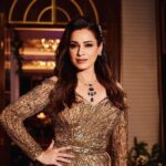 Neelam Kothari Instagram - The Golden Lady.. ✨✨ If worn correctly nothing more regal than gold. Jewellery: @neelamjewelsofficial Styled by : @mohitrai Assisted by @tarangagarwalofficial Outfit : @falgunishanepeacock Make up : @richie_muah Hair : @thakuramit190