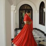 Nikhila Vimal Instagram - Lost in the twirl of red♥️ #twirling dreams #twirl_around_world Makeup @unnips Costume & styling @fariz_lezin_ Photography @merin__georg Location @azora.hotels