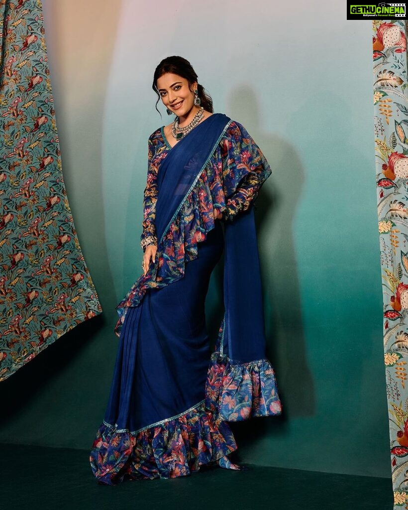 Nisha Agarwal Instagram - Take cues from @nishaaggarwal this Diwali!🪔✨🎆 Style our dark blue frilled ruffle sare crafted in @rishiandvibhuti ’s signature prints over the edges. Pair it with our full sleeve blouse or go a contemporary way. 🧿💙🦋 🔎 Search the code GGRVSAR01 on Nykaa Fashion to shop. 🛒www.nykaafashion.com Exclusively available on Nykaa Fashion. Express Shipping Available. #GajraGang #RishiAndVibhuti #NykaaFashion #Nykaa #JanhviKapoor #Tyohar #NewArrivals #Indianwear #FestiveStyles #FestiveCollection #Diwali #Fashion #Explore #Trending