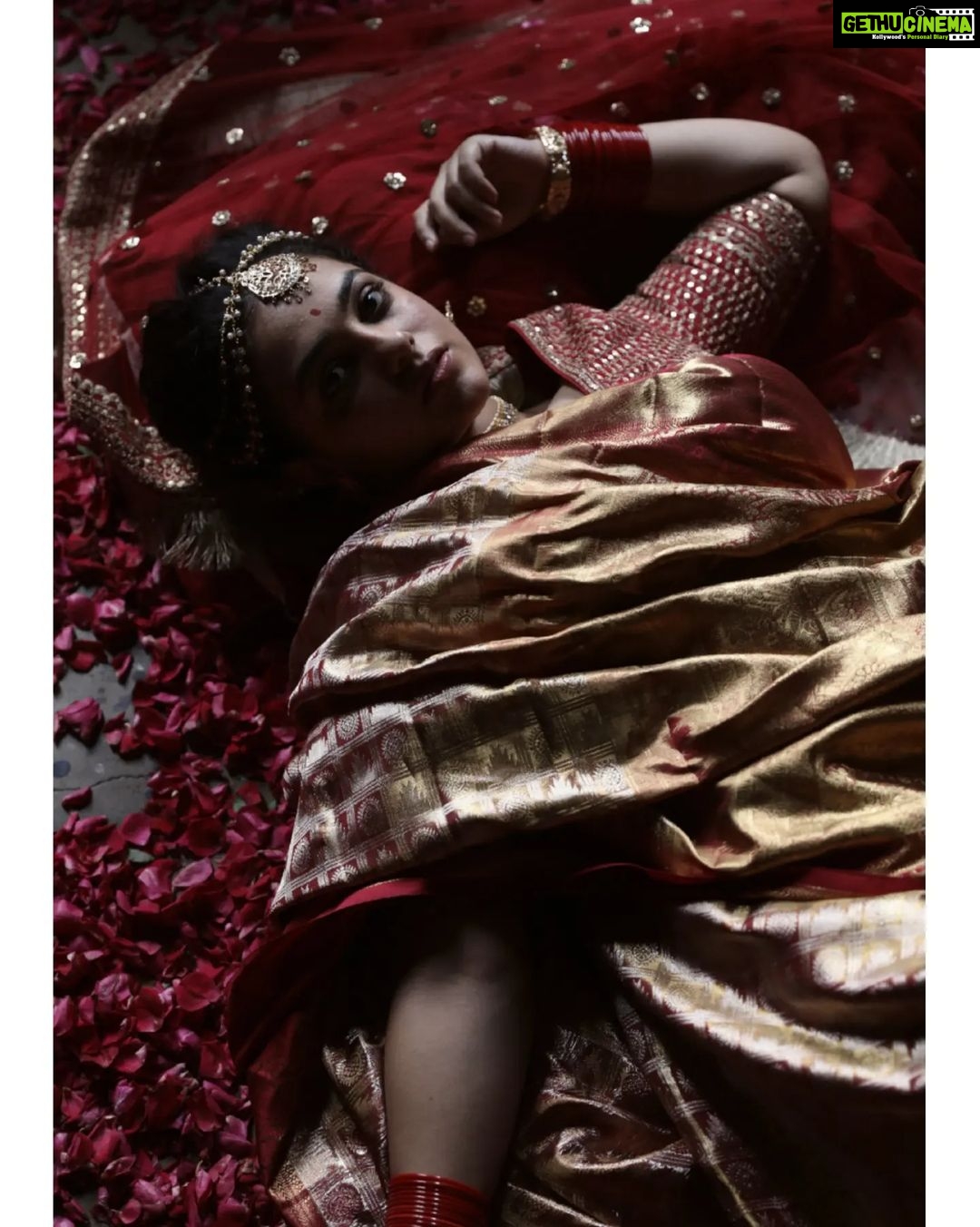 Nithya Menen Instagram - On this auspicious occasion of Navaratri - This is inspired from a vintage painting from India depicting a woman in red saree. The Divine Feminine - Goddess Durga is considered to be the physical form of ‘Shakti’ or ‘Universal Energy’. She was created by the Hindu Gods to annihilate the notorious demon ‘Mahisasura’. Reimagine is an attempt at creating a fresh look and feel about a character and spinning a new story out of them. But all are re-interpretations with an intriguing approach, while retaining the visual essence of the original works. Creative direction and styling, make up done by @rishabhad Photography done by @sauvicksengupta Clothes @jayshree_studios Jewelry @tahir_somethingsopure