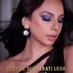 Nitibha Kaul Instagram - AD | It’s that time of the year where we #GlitterUp for the festivities & @lakmeindia’s newest Glitterati Range is perfect to do that! 💥✨ A bold shimmering peacock eye, why not 🦚 I created this beautiful eye look using some of my favourite products. ✨ Here’s what I used from the Glitterati Collection : - Luminous Skin Tint Foundation - Warm Sand - Glitterati Eye Paint - Champagne Rain - Glitterati Shine Eyeliner - Daring Blue & Invincible Purple - Glitterati Shine Lipstick - Red Pop #LakmeGlitterati #LakmeGlitteratiCollection #LakmeMakeUp #LakmeIndia #FestiveGlam