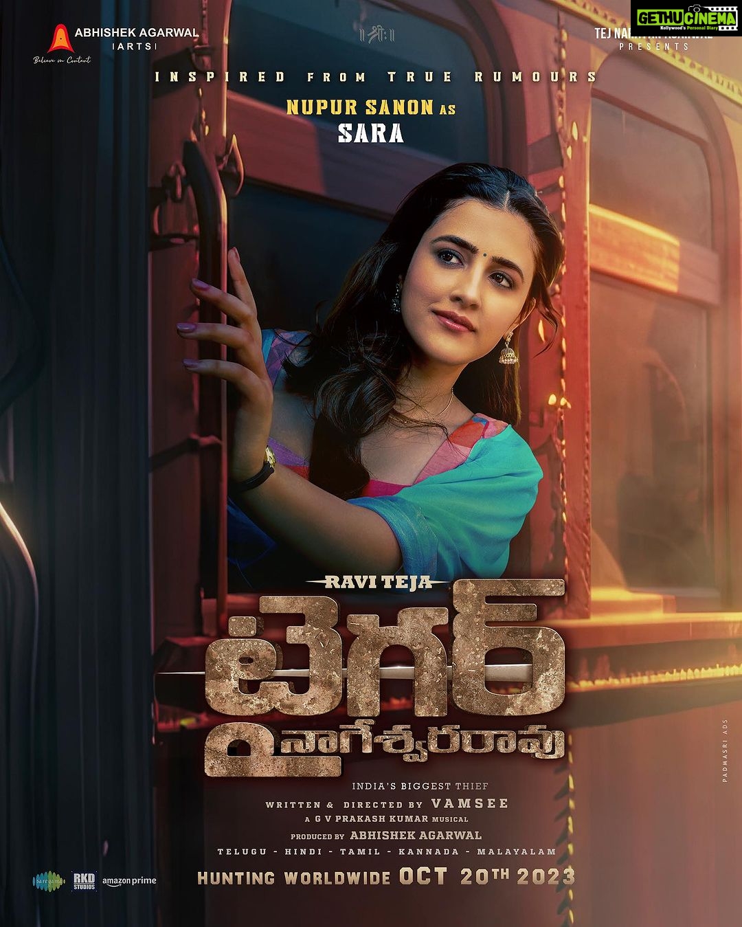 Nupur Sanon Instagram - Here’s my first look from my first PAN-India film!! *goosebumps* 🥹🧿 • Meet our TIGER'S LOVE ❤️ Introducing @nupursanon as the lovely Sara from the GRAND WORLD of #TigerNageswaraRao 🥷 WORLDWIDE HUNT begins from October 20th 🐯🔥 @raviteja_2628 @dirvamsikrishna @abhishekofficl @anupampkher @renuudesai @gayatribhardwaj__ @senguptajisshu @gvprakash @madhie_dop @kollaavinash @srikanth_vissa @castingchhabra @mayank_singhaniya @archana.singal.12 @saregamatelugu @aaartsofficial