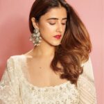 Nupur Sanon Instagram - I did a proper RED lip for the first time!!❤️❤️‼️❤️❤️ • Team Sara : Hmu - @makeupbydevanshii Styled by - @ashwin_ash1 & @hassankhan_3 Style team - @ahmedxmirza Outfit - @jade_bymk Jewellery- @houseofqc Shot by - @visualaffairs_va