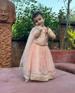 Pooja Banerjee Instagram - #InCollaboration with #FirstCry When I was pregnant with Sana, I kept imagining dressing up my baby with cute little outfits, kept dreaming of using all the baby gears to make her comfortable and entertained. But , I also had a working pregnancy and that meant I was completely occupied with work and I didn’t have the energy to step out to shop for a lot of products for Sana, that’s when @firstcryindia came to my rescue, they had everything from baby care to baby gears to mama’s needs as well & I never had to worry about heading out to shop for my baby post finishing my shoot. Everything that my @sanassejwaal needed was delivered home. This time again, I had lots of travelling and work commitments (I’m writing this as I board for my next flight) and I wanted to save my time by visiting the store so got this beautiful dress for Diwali for @sanassejwaal from @firstcryindia . @sanassejwaal loved wearing this outfit and posing in it. So if you also need to get anything for your baby head to @firstcryIndia, also they are super fast with their deliveries. Use my personalized code POOJADW50 to get a fantastic 50% off on Fashion and a generous 45% off on everything else. 🛍️✨ Have a wonderful festive season with @firstcryIndia #firstcrywalidiwali23 #firstcrywaliDiwali #firstcryindia #firstcry #FussNowAtFirstcry #firstcryfashion #kidsfashion Goa