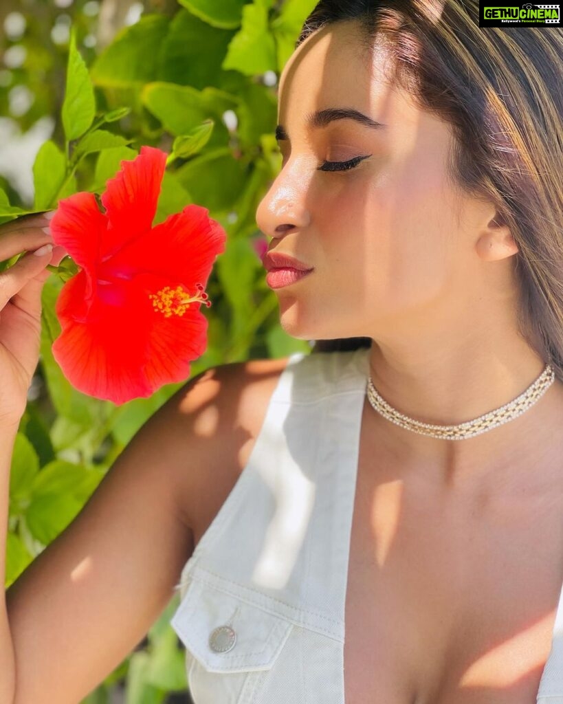 Pooja Bhalekar Instagram - Whispering my secrets to the flower 🌺