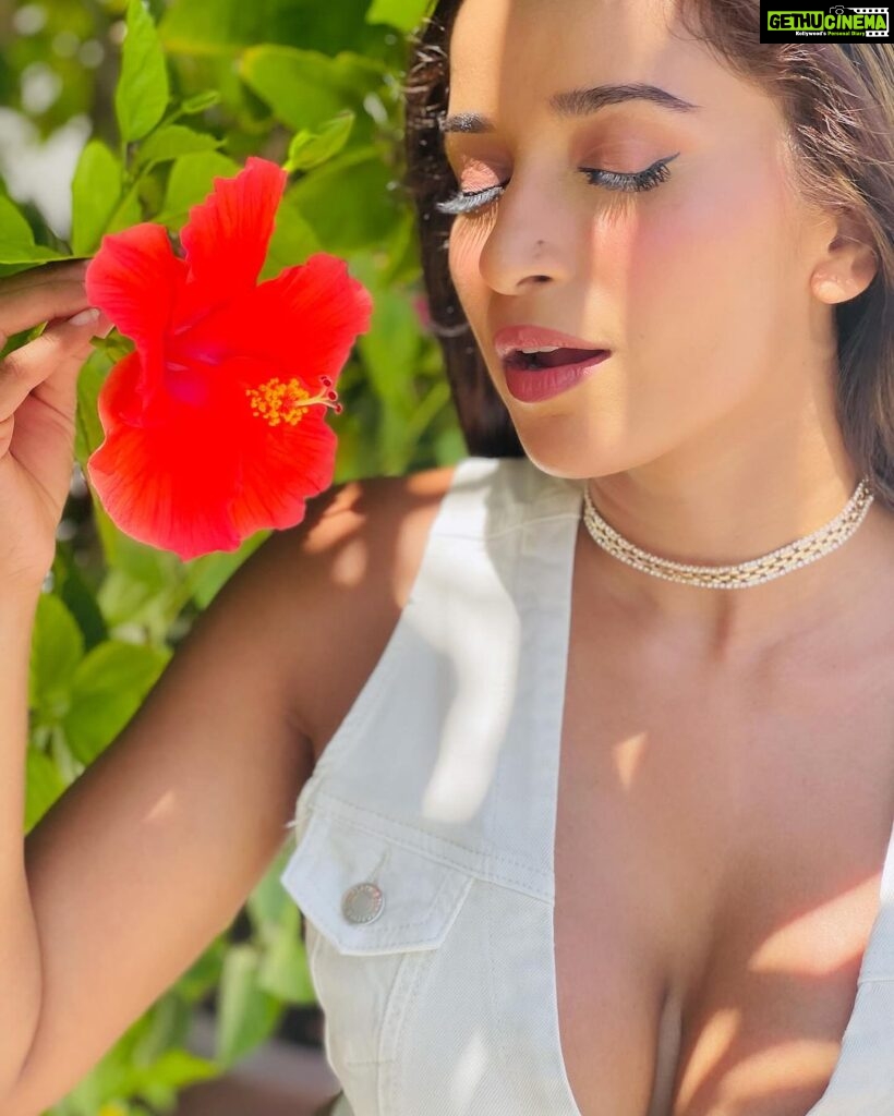 Pooja Bhalekar Instagram - Whispering my secrets to the flower 🌺