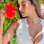 Pooja Bhalekar Instagram - Whispering my secrets to the flower 🌺