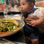Pooja Ramachandran Instagram - Our first pizza date lunch with @kiaankokken The day is not far away when Kiaan starts eating our favourite with us sooooon!! Kiaan’s first mall visit. :) #lafamilia #familytime #pizzalovers #lovemyfamily #treatday #sourdoughpizzas #kiaankokken #babysdayout
