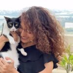 Pooja Ramachandran Instagram - A moment with my mone.. 😻 #tuxcat #indie #iadopt #adoptdontshop #blackandwhitecat