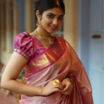 Pragya Nagra Instagram - This Diwali, step into the festivities with ‘Sanjavi,’ a stunning Kanjivaram silk saree in subtle pink, adorned with delicate gold motifs and an opulent gold-woven pallu, capturing the essence of the festival of lights. It’s a celebration of tradition and grace. As you light up your home with diyas and lamps, let ‘Sanjavi’ light up your style. The subtle pink hue exudes elegance, while the magenta border adds an elegant contrast. Complete your look with the matching magenta blouse piece, and you’re all set to make a statement at Diwali gatherings. Let ‘Sanjavi’ be your companion in embracing the radiance and tradition of Diwali. Wishing you a sparkling and joy-filled Diwali! Shop now: https://taribygayatri.com/product/sanjavi/ Captured and edited: @chitrapriyadarshini Model: @pragyanagra Makeup: @m.m_by_madonna Saree: @taribygayatri Stylist: @taribygayatri Location: @chettinadhotels_ #SareeStoryUnveiledByTari #sydneysareeshops #taribygayatri #sareelove #sydneysareelover #tamilweddingssydney #sydneysareegallery