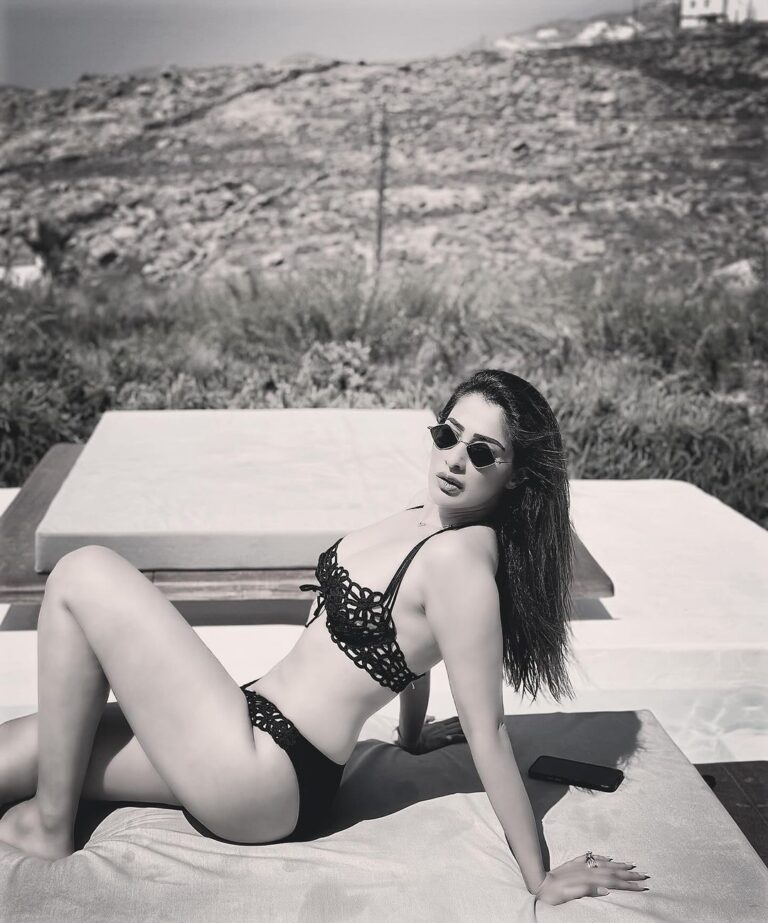 Raai Laxmi Instagram - She sees in black & white but loves in colours 🖤🤍🧿