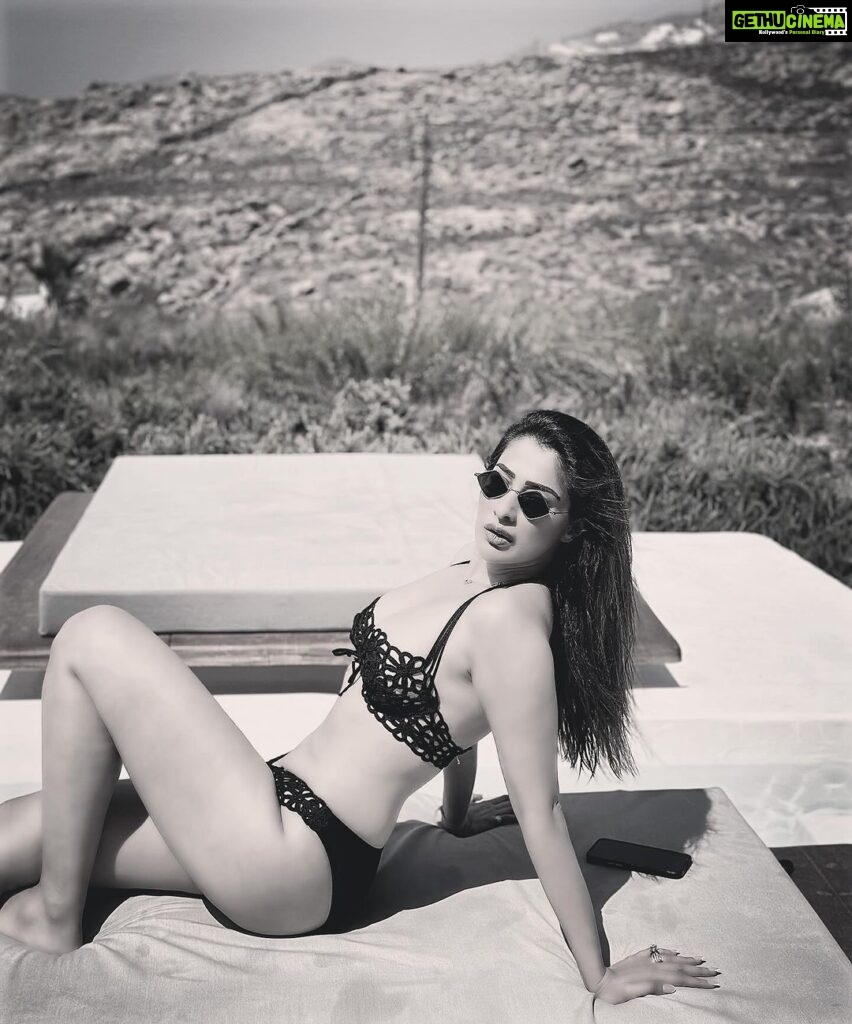 Raai Laxmi Instagram - She sees in black & white but loves in colours 🖤🤍🧿