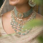 Rachel David Instagram - while all my friends are actually getting married, I’m playing pretend // 🐒 . . . Jewellery: @amaera_jewels Saree: @timberline_aruvithura Styling, Makeup: @shimmerme.co Photography: @nevinphilipphotography Venue: @farmhousesocial