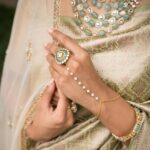 Rachel David Instagram - while all my friends are actually getting married, I’m playing pretend // 🐒 . . . Jewellery: @amaera_jewels Saree: @timberline_aruvithura Styling, Makeup: @shimmerme.co Photography: @nevinphilipphotography Venue: @farmhousesocial