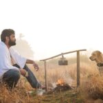 Rakshit Shetty Instagram - Not every experience has to be extraordinarily beautiful to bring one joy. Happiness resides in small fleeting moments of life. For you. For me. For Dharma & his Charlie 😊 #777CharlieDiaries PC: @guru_kaup #777Charlie @kiranraj_k @paramvah_studios