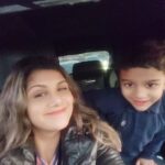 Rambha Instagram - Shivin and Sasha eating away all laanyas gummies 🤣#kids#school #parking #waiting #familytime #family #gummybears
