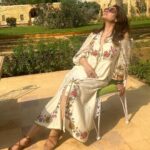 Raveena Tandon Instagram - In an around … soaking up the sun…☀️ Ootd-Outfit - @chandrimaofficial Styled by @poojagulabani