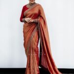 Rimi Tomy Instagram - ❤️❤️Flaunting the richness of our culture in a saree @fatiz_official @mr_arunjith @shoshank_makeup @mayoorajewelerydesigns @doms.2010