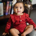 Rishab Shetty Instagram - Tiny toes and endless smiles – a bundle of pure joy #raadyashetty #babyphotography #pragatishetty #ranvitshetty #rishabshetty