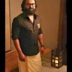 Rishab Shetty Instagram - Timeless fusion – Here we embrace the elegance of a black shirt with the traditional charm. Classic meets contemporary in this ensemble of contrasts. Styled by @pragathirishabshetty #houseofpragathishetty #siima2023 #kantara