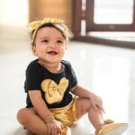 Rishab Shetty Instagram - Tiny toes and endless smiles – a bundle of pure joy #raadyashetty #babyphotography #pragatishetty #ranvitshetty #rishabshetty