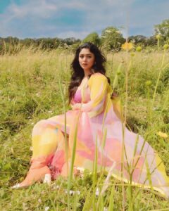 Ritabhari Chakraborty Instagram - “We shall send up a fleet of kites, scrawled with the words of the day.  Kites of bleached muslin stretched over glowing cross-sticks, dressed  with flowing tails. 

They will be seen drifting above the clouds, all our blameless, childish hopes. “

Adding color to your gram in my rainbow hues and @theater.xyz boots 🧡🌸🤍