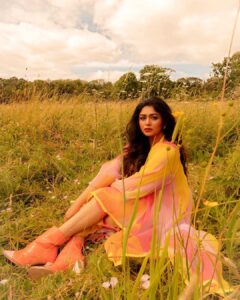 Ritabhari Chakraborty Instagram - “We shall send up a fleet of kites, scrawled with the words of the day.  Kites of bleached muslin stretched over glowing cross-sticks, dressed  with flowing tails. 

They will be seen drifting above the clouds, all our blameless, childish hopes. “

Adding color to your gram in my rainbow hues and @theater.xyz boots 🧡🌸🤍
