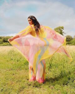 Ritabhari Chakraborty Instagram - “We shall send up a fleet of kites, scrawled with the words of the day.  Kites of bleached muslin stretched over glowing cross-sticks, dressed  with flowing tails. 

They will be seen drifting above the clouds, all our blameless, childish hopes. “

Adding color to your gram in my rainbow hues and @theater.xyz boots 🧡🌸🤍
