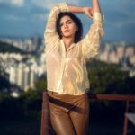 Ruchira Jadhav Instagram - Her stare as radiant as the Sun's glare #ruchirasays both intense, a fiery love affair ❤️‍🔥 #RuchiraJadhav in & as #TheGoldenHour ☀️